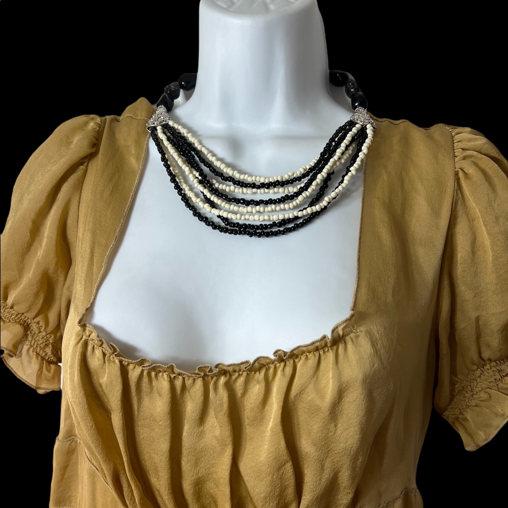 Beautiful Black And Cream Colored Beaded Multi Stranded Necklace